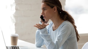 stressed woman on phone