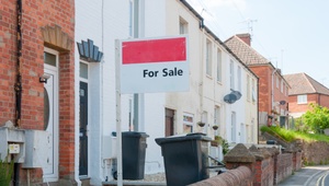 for sale sign outside of house