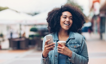 Woman holding her mobile phone