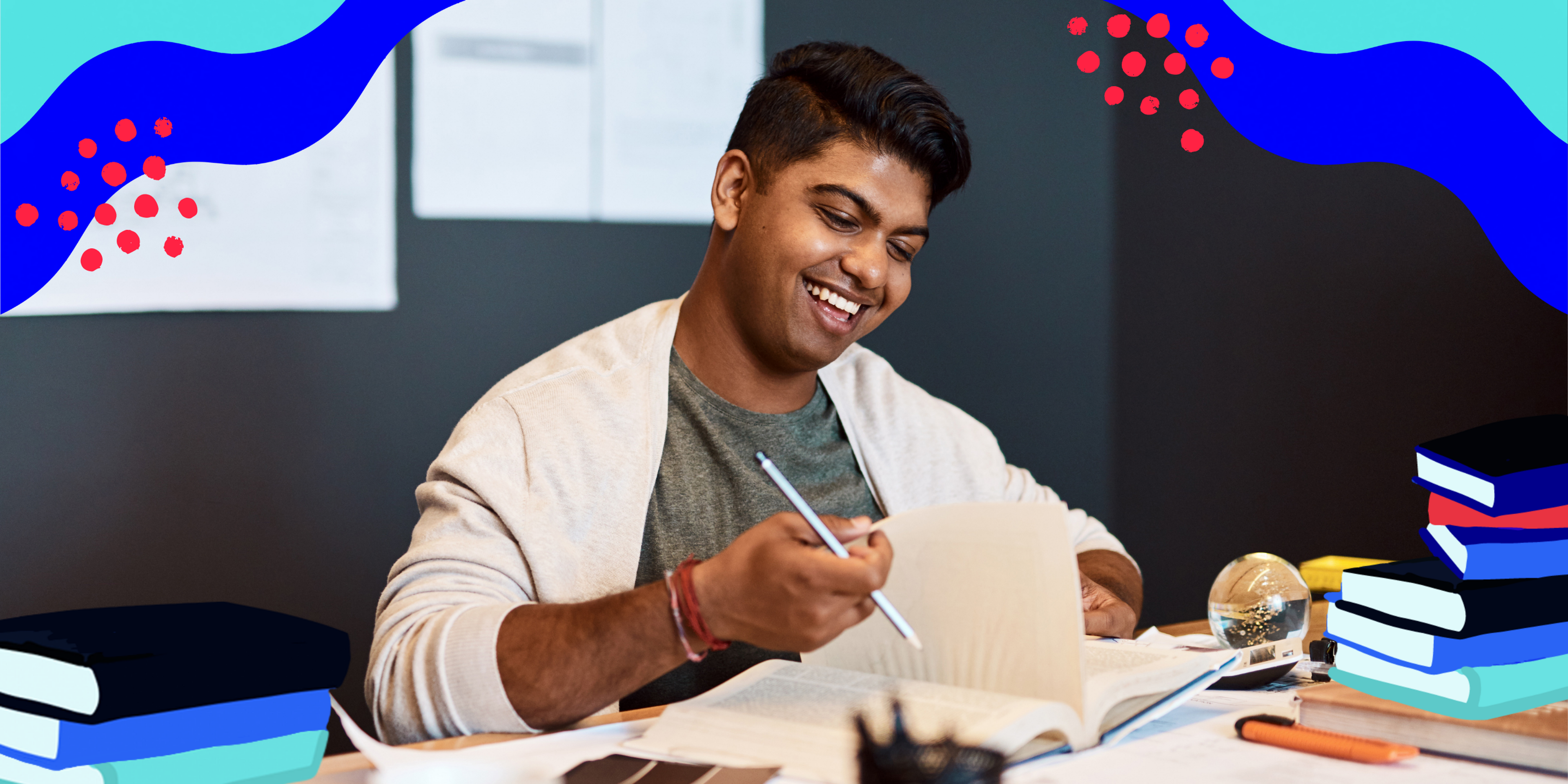 young indian man writing in a journal and smiling, framed by blue lines