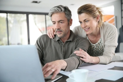 couple looking at computer