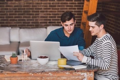 two men talking about bills
