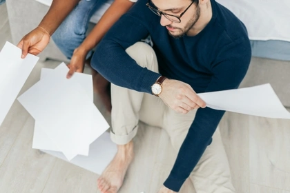 couple looking at bills