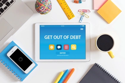 Get out of debt text displaying on tablet screen