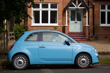 car parked outside of house