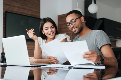 couple looking at paperwork together