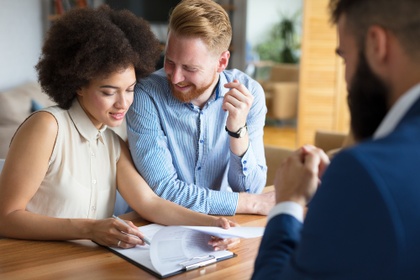 couple looking at a mortgage application