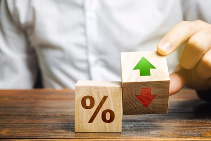 % symbol written on wooden cube