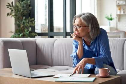 older woman on laptop