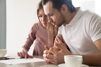 Couple looking over paperwork
