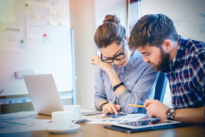 couple working together at desk