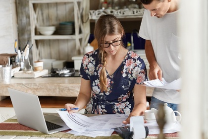 Couple looking at documents together