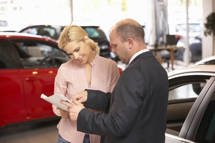 woman buying a car
