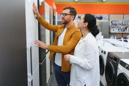 Couple shopping for a fridge