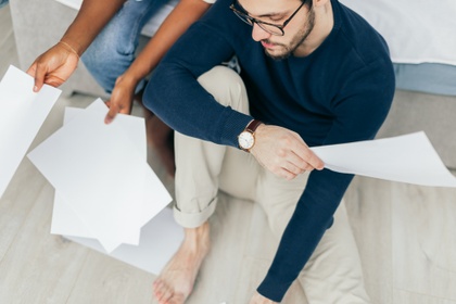 couple looking at bills
