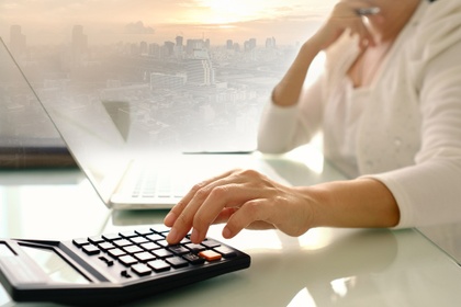 woman using a calculator