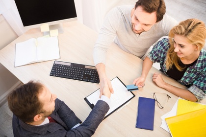 couple at bank getting credit card
