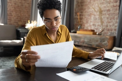 Woman looking at a loan statement