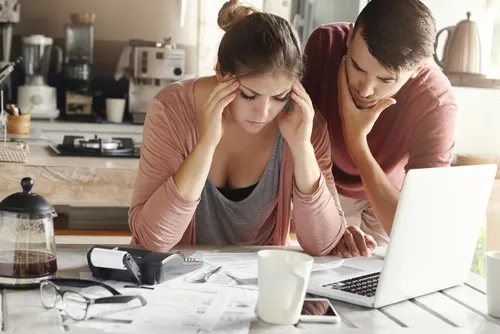 Couple looking at their bills