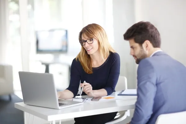 bank worker on laptop