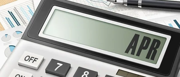 Close up of a calculator showing "APR" on the screen