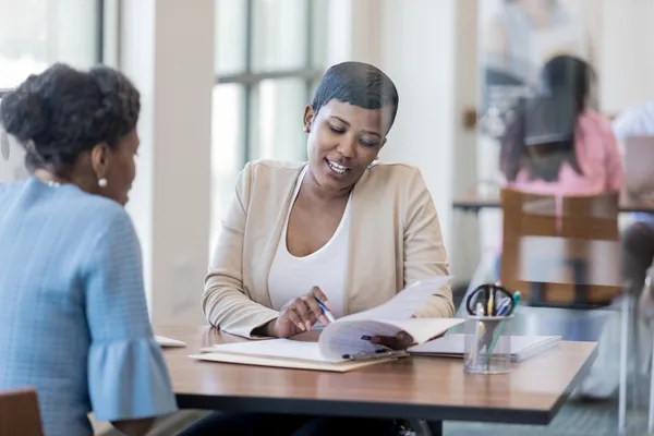Lady speaking to a mortgage advisor