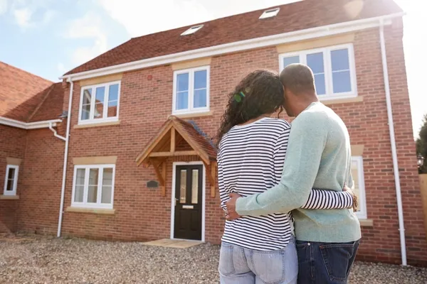 Couple looking at new house