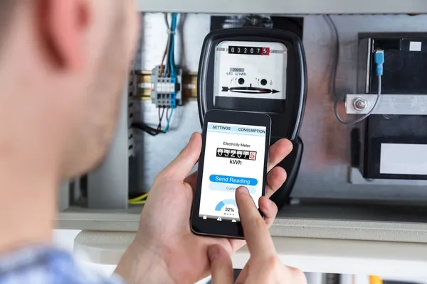 Man checking energy reading