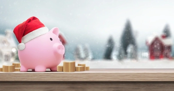 Piggy bank with Christmas hat on