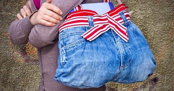 woman with a repurposed denim bag