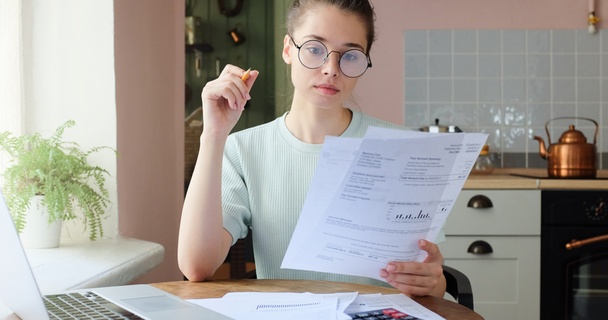 Woman checking energy bills