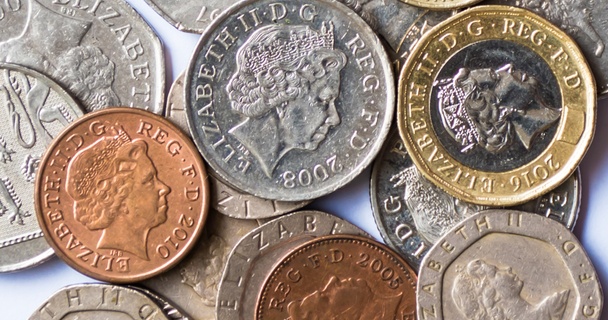 selection of British coins featuring the Queen's face