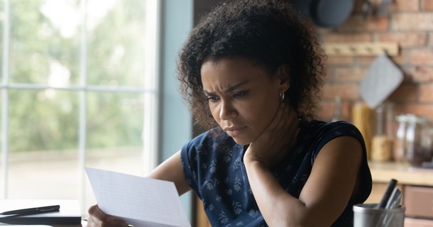 woman reading letter