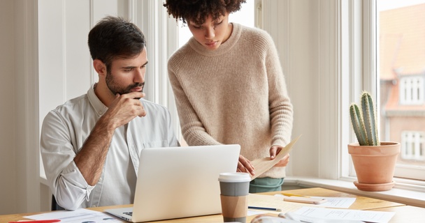 Couple using laptop