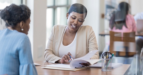 Lady speaking to a mortgage advisor