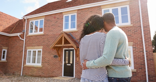 Couple looking at new house