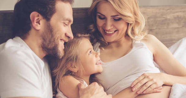 Happy couple with child