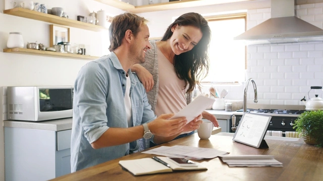 Couple looking at their bills