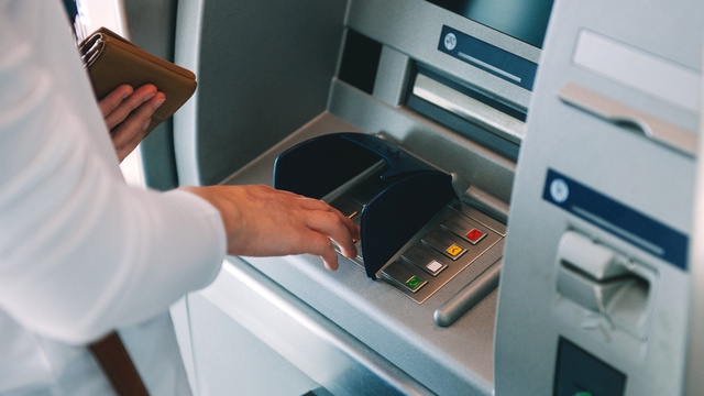 withdrawing cash from atm