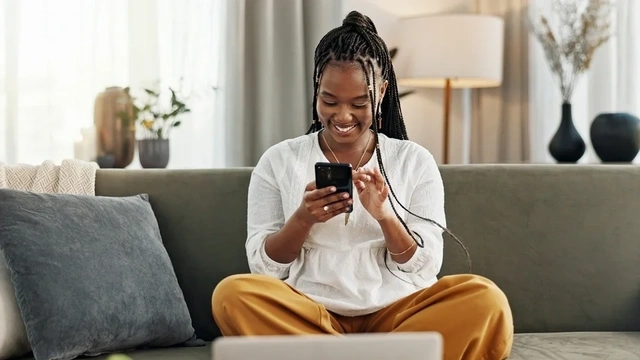 Happy woman on her phone