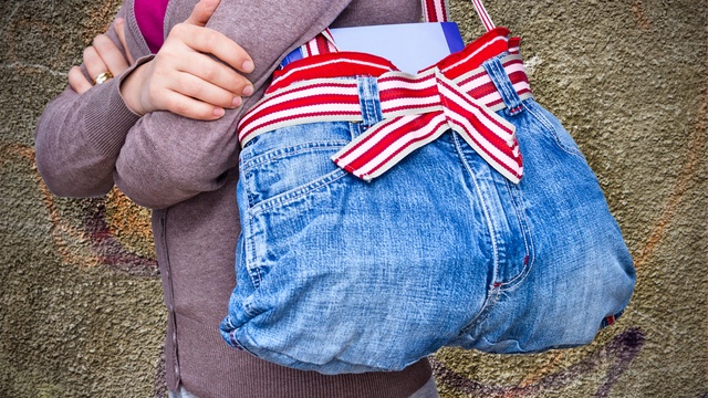 woman with a repurposed denim bag