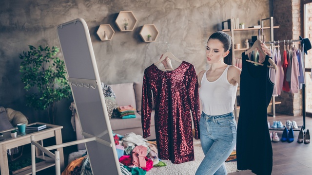 woman trying on clothes