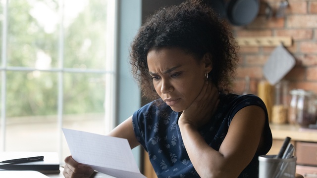 woman reading letter