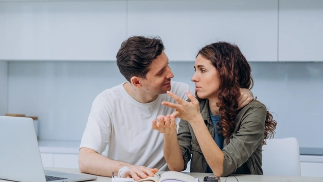 couple having a conversation at a table