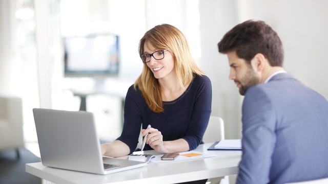 bank worker on laptop