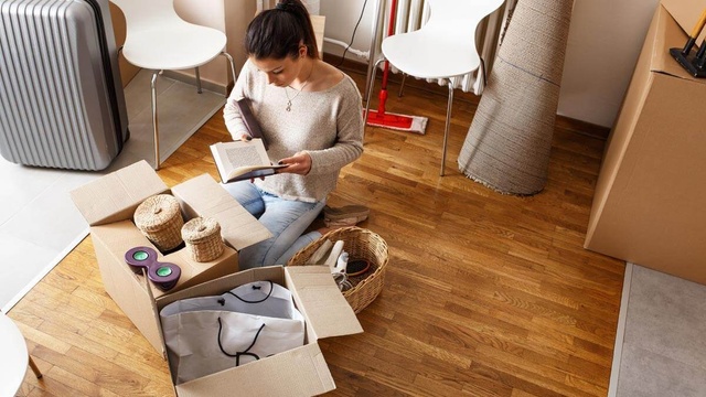 Person packing away possessions