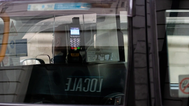 card reader in the back of a black cab