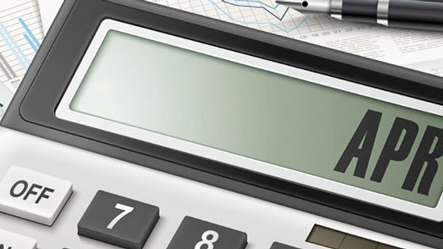Close up of a calculator showing "APR" on the screen