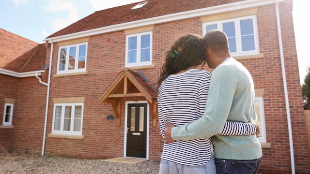 Couple looking at new house