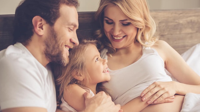 Happy couple with child